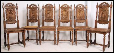 A set of 6 French country oak provincial dining chairs having rattan weave seats raised on block