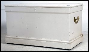 A good Victorian white painted pine blanket box chest of large size having plinth base and hinged