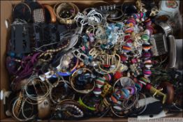 A good collection of assorted costume jewellery to include bangles, bracelets,