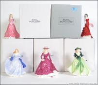 A group of 5 Royal Worcester figurines.