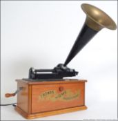 A 20th century Thomas Home Phonograph radio and cassette deck raised on wooden plinth with horn (