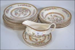 A 20th century Washington China Indian Tree pattern part dinner / tea service being stamped to