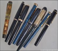 A collection of fountain pens to include 14ct gold nibs.