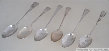 A collection of 6 silver hallmarked teaspoons all with etched stems.