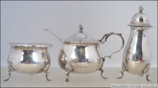 A silver hallmarked 3 piece cruet set to include table salt,