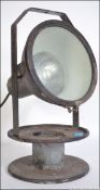 An early 20th century vintage industrial search light / spot light.