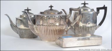 An Edwardian Walker & Hall silver plated coffee pot - teapot service together with hot water jug.