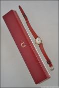 A ladies 9ct gold Omega wristwatch / dress watch.