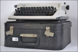 A vintage mid century portable Erica typewriter,
