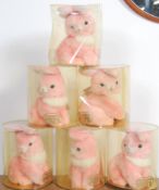 A group of original Peterkin made in England pink bunnies in original plastic cases.
