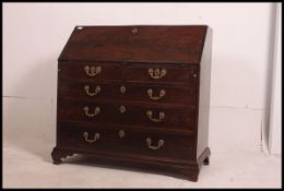 An early 19th century Georgian solid mahogany bureau desk.