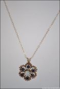 A 9ct gold, opal and sapphire ladies necklace.
