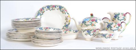 An early 20th century part dinner / tea service by Royal Cauldon in the ' Victoria ' pattern