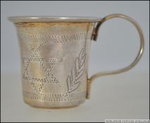 A silver hallmarked wine tasting vessel - miniature tankard of Yiddish - Jewish origin having star
