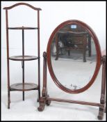 A Victorian mahogany toilet swing mirror of good form together with a 3 tier 1920's oak cake stand