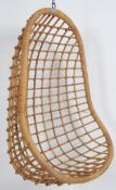 A 1960's / mid century rattan weave egg chair swivel - hanging complete with cat metal hook.