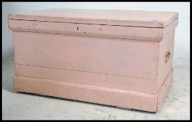 A Victorian painted pine blanket box chest of large size having plinth base and hinged top.