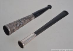 2 silver collared cheroots dating to the 20th century, one marked Sterling,