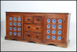 A stunning large arabic sheesham and brass sideboard dresser.