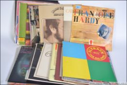 A collection of vinyl long play LP records of various genres and various artists to include