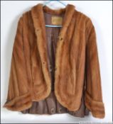 A vintage mid century Canadian ( Windsor Ontario )short hip length ladies fur cape,