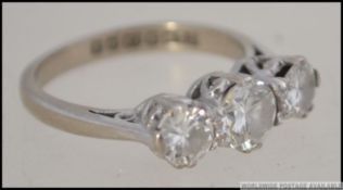 An 18ct white gold and 3 stone diamond ring, approx 1ct of diamonds across 3 stones.