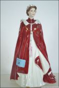 A Royal Worcester porcelain figure, In Celebration of the Queen's 80th Birthday 2006,