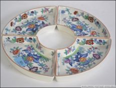 An early 20th century Booths ' The Pompadour ' 4 piece Chinese floral circular our d'oeuvres set.