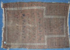 A 19th century handwoven Islamic Iranian rug with red ground having central mihrab, tassled ends.