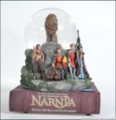 A very rare collectable Chronicles of Narnia musical snow globe representing the movie / book 