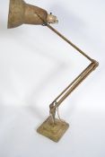 A pre war 1930's scrumble painted Industrial Herbert Terry anglepoise desk lamp raised on square