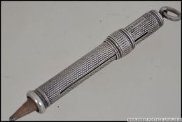 A Sampson & Morden silver hallmarked propelling pencil in working order. Hallmarked for London 1900.