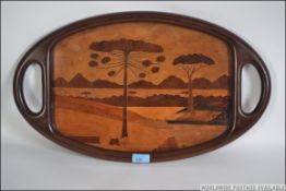 A 1930's Art Deco inlaid / parquetry / marquetry tray constructed using different samples of wood
