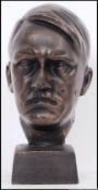 A small vintage style cast iron bust of Nazi dictator Adolf Hitler. 21cm long.