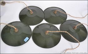 A group of five Military industrial mid 20th century hanging ceiling light fixtures - chandeliers.