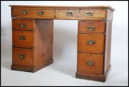 A 1st World War pine twin pedestal campaign desk.