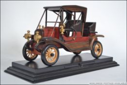 A collectable hand crafted Thomas Pacconi model wooden car,