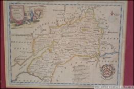 A framed and glazed late 19th century coloured lithograph map of Gloucestershire by Kitchen.