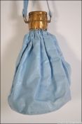 A vintage ladies scissor metamorphic ladies evening bag.