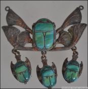 An unusual early 20th century white metal and agate stone Art Nouveau necklace pendant with scarab