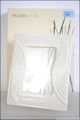 A contemporary Belleek ' Living ' ceramic picture frame complete in the original packaging,
