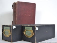 Two boxes of Magic Lantern slides with 50+ slides of Heraldic seals and 25+ slides of royal seals.