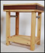 A contemporary substantial butchers block / kitchen island on a square leg frame,