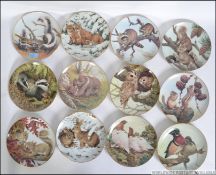 A series of twelve China collectors plates depicting animals in their natural habitat.