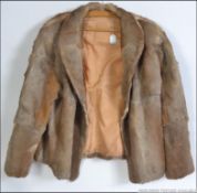 A vintage deer / gazelle / antelope skin fur short ladies jacket , a single button to high waist,