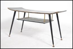 A 1950's mid century retro 2 tone coffee table having bow end formica top with alternate colour