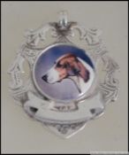 A good armorial silver pocket watch chain fob with enamel pictorial of a hunting dog - hound.