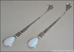 A pair of ladies silver marcasite and opal set Art Deco style drop earrings.