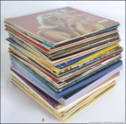 A collection of vintage records of differing genres to include show tunes, classical,