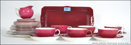 A Royal Doulton ' Savoy Hotel ' tea service comprising tray, cups, saucers, plates,